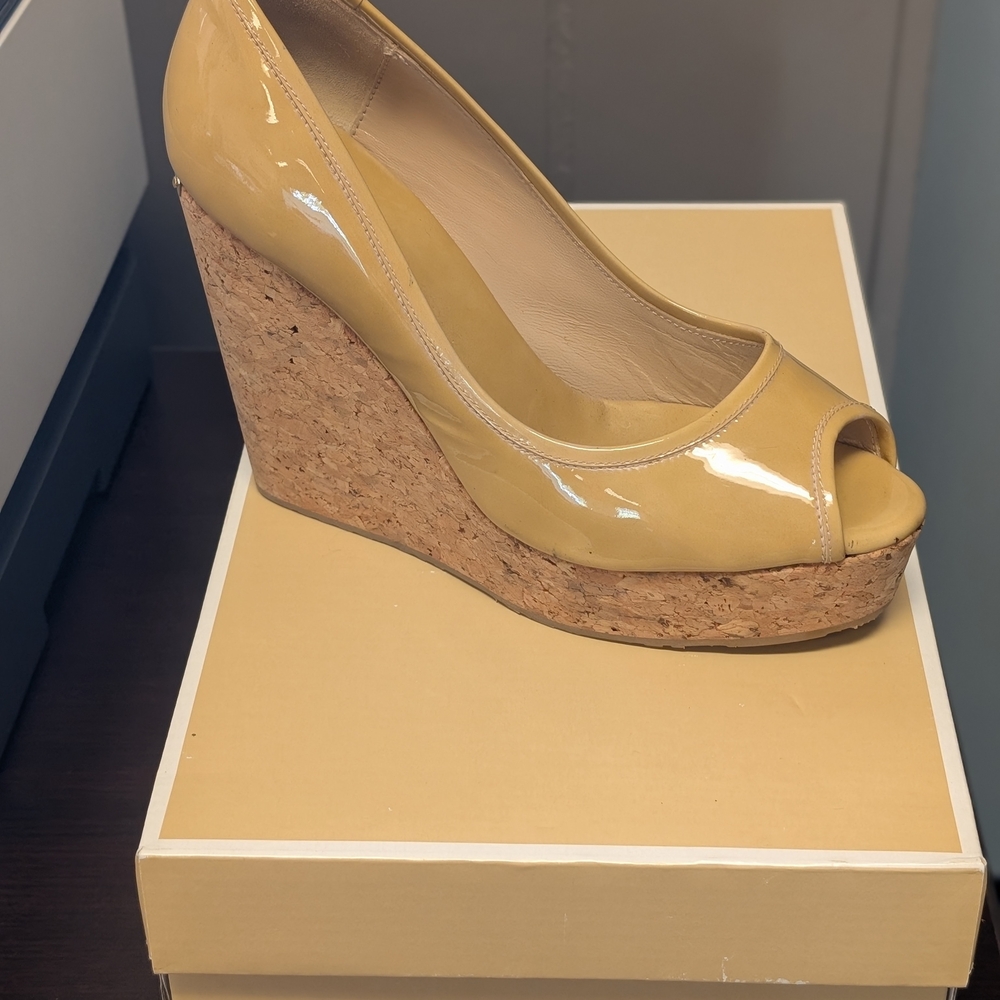 Elegant Tan Peep-Toe Wedge by [Brand]